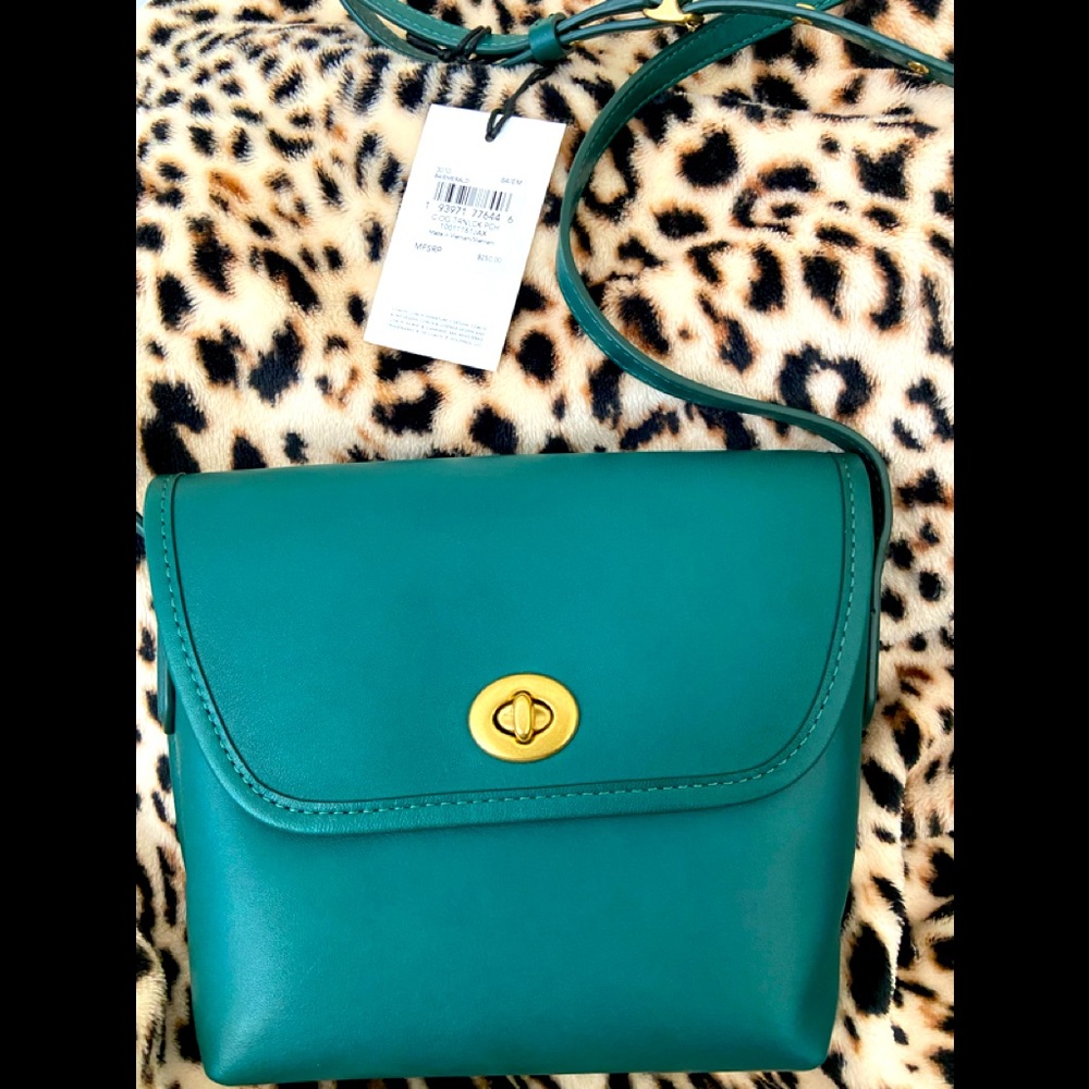 Emerald green turn lock cross body